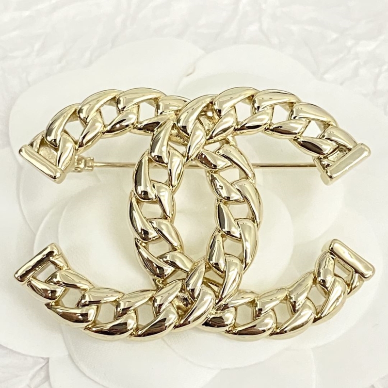 Ch*el brooches